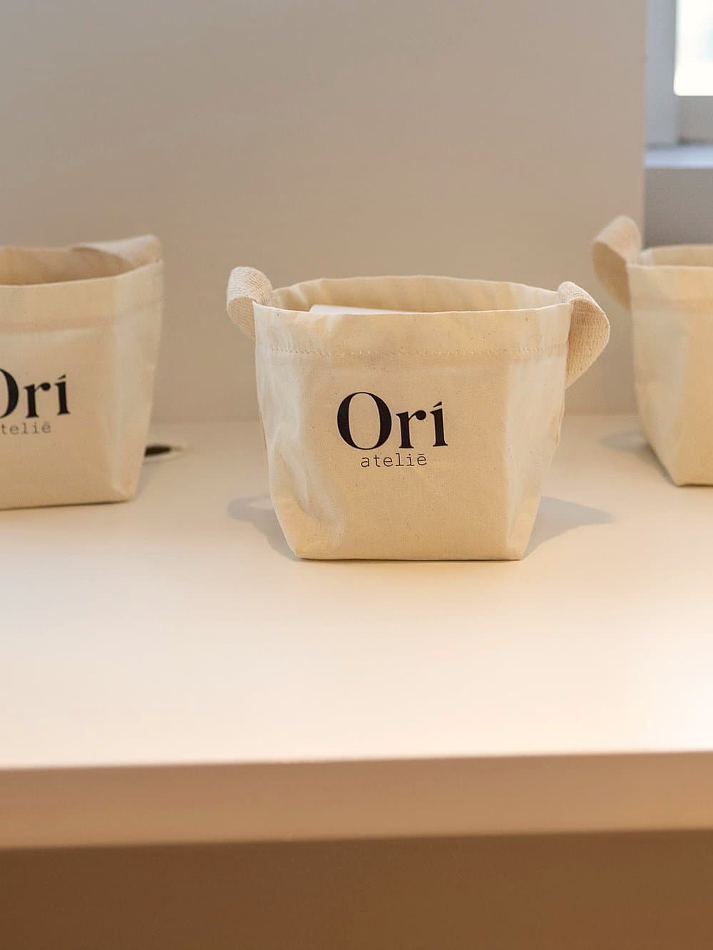 Sacos de algodão da Orí prontos para levar a vela